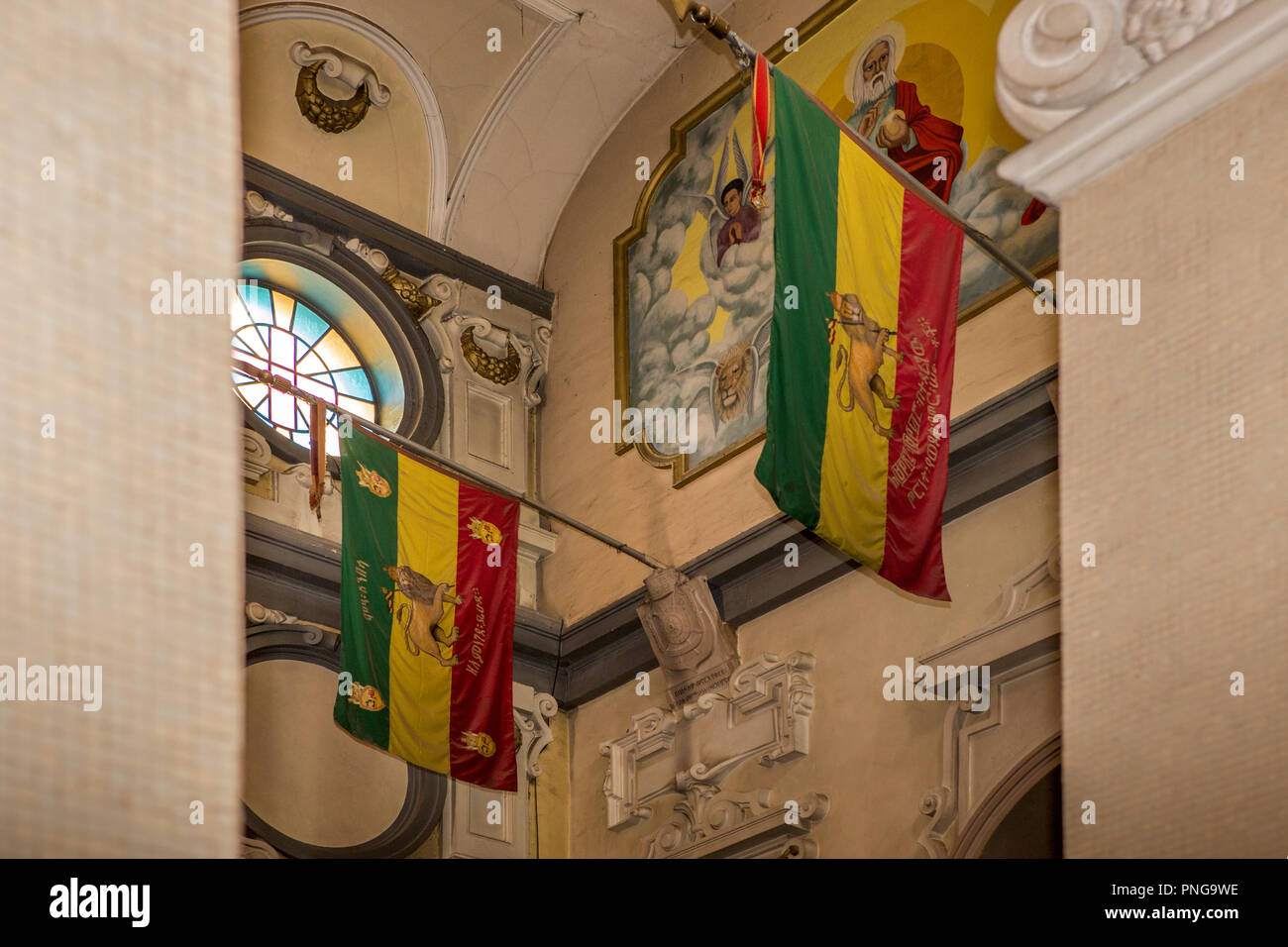 Flags, Interior, Holy Trinity Cathedral, aka Kidist Selassie  in Amharic, Ethiopian Orthodox Tewahedo Church, resting place of Emperor Haile Selassi Stock Photo