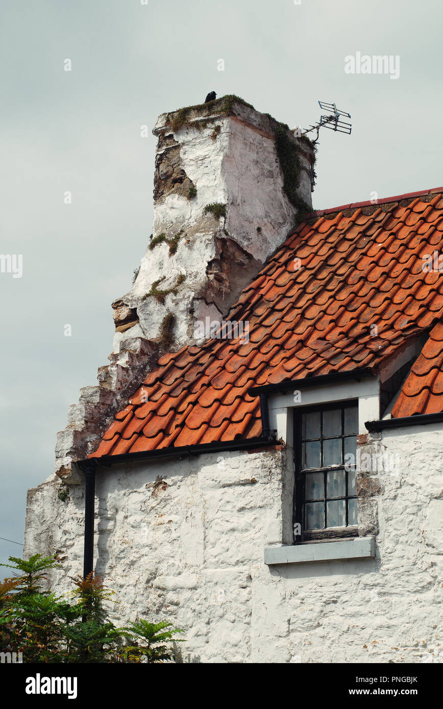 Scottish roof with chimney and antenna hires stock photography and