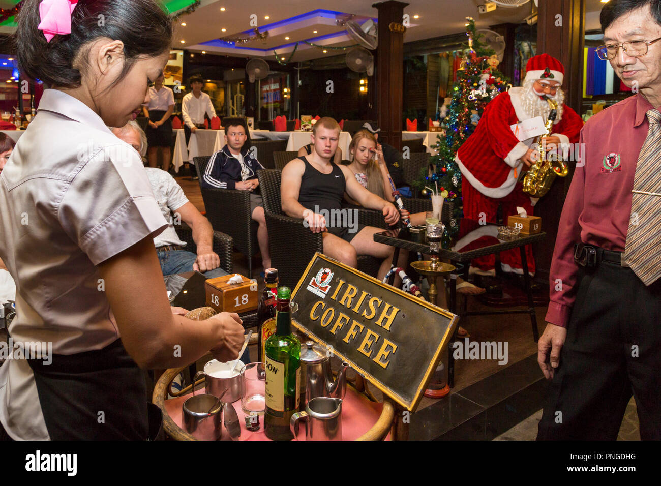 Father Christmas in a bar on Walking Street,Pattaya, Thailand Stock Photo