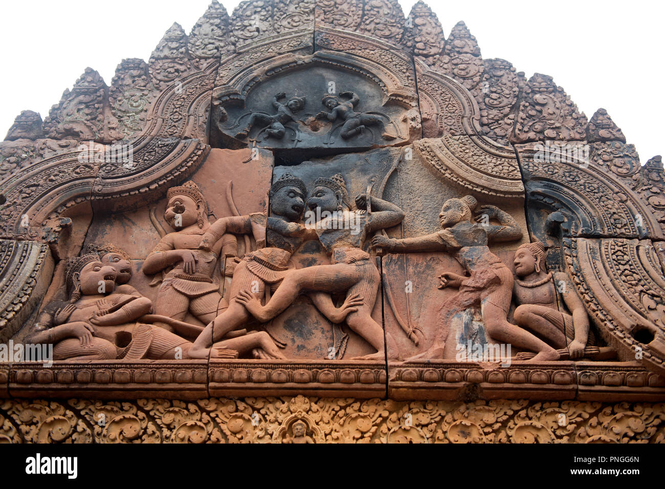 Cambodia, Siem Raep, Angkor, Detail of complicated carvings on red sandstone, Banteay Srei Temple Stock Photo