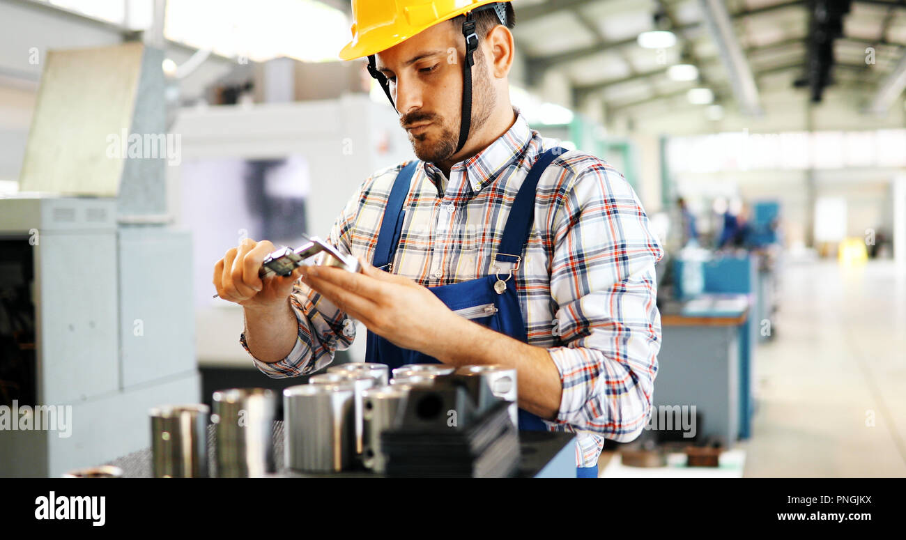 modern industrial machine operator working in factory Stock Photo Alamy