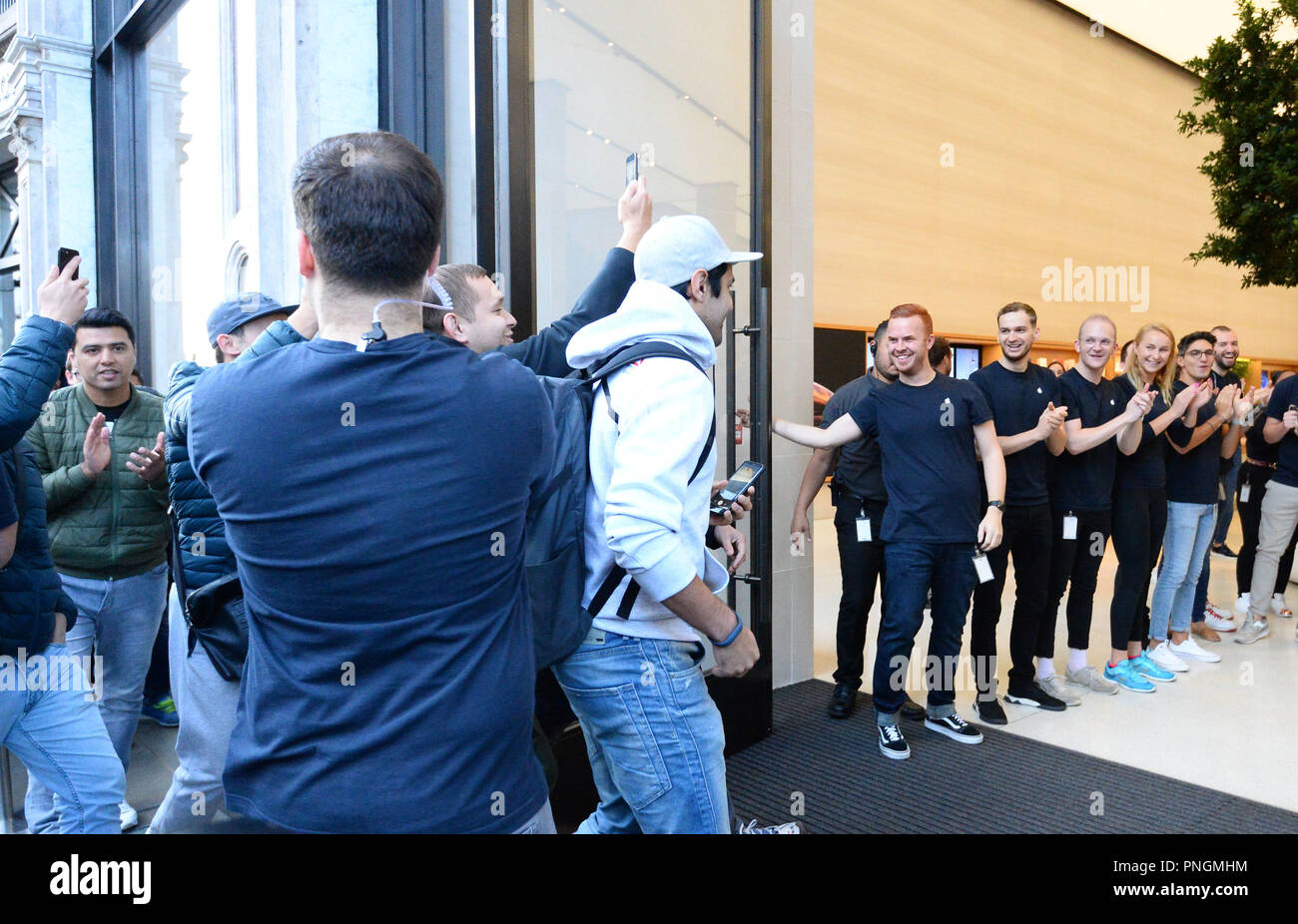The first customers enter the Apple Store in Regent Street, central London, as the iPhone XS and XS Max go on sale in the UK for the first time, alongside the Apple Watch Series 4. Stock Photo