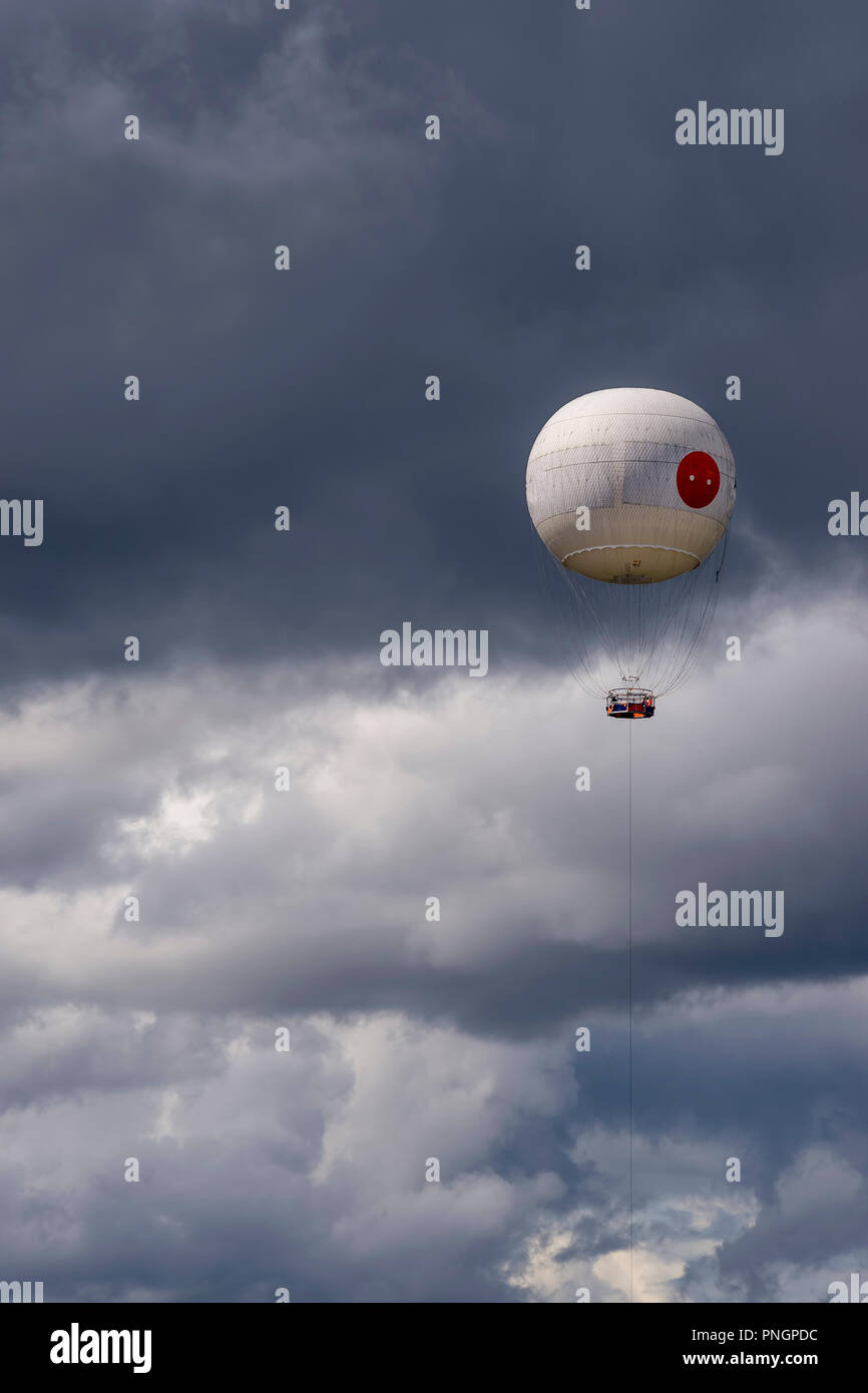 Hot air balloon against a dramatic cloudy sky Stock Photo - Alamy
