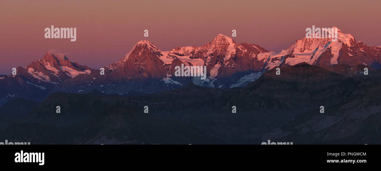 Famous mountains Eiger, Monch and Jungfrau at sunset. Switzerland Stock ...