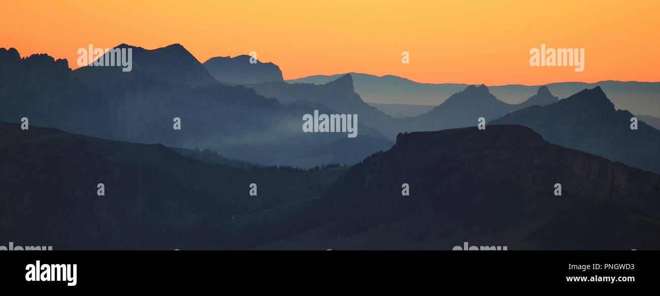Mountain ranges seen from Mount Niesen at sunset. Landscape in Switzerland. Stock Photo