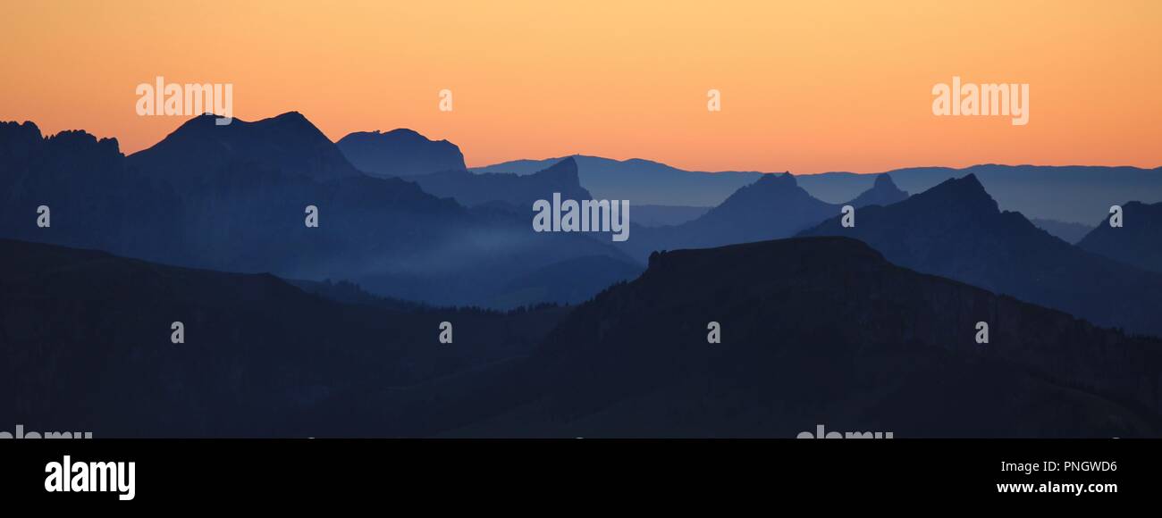 Mountain ranges at sunset. View from Mount Niesen. Stock Photo
