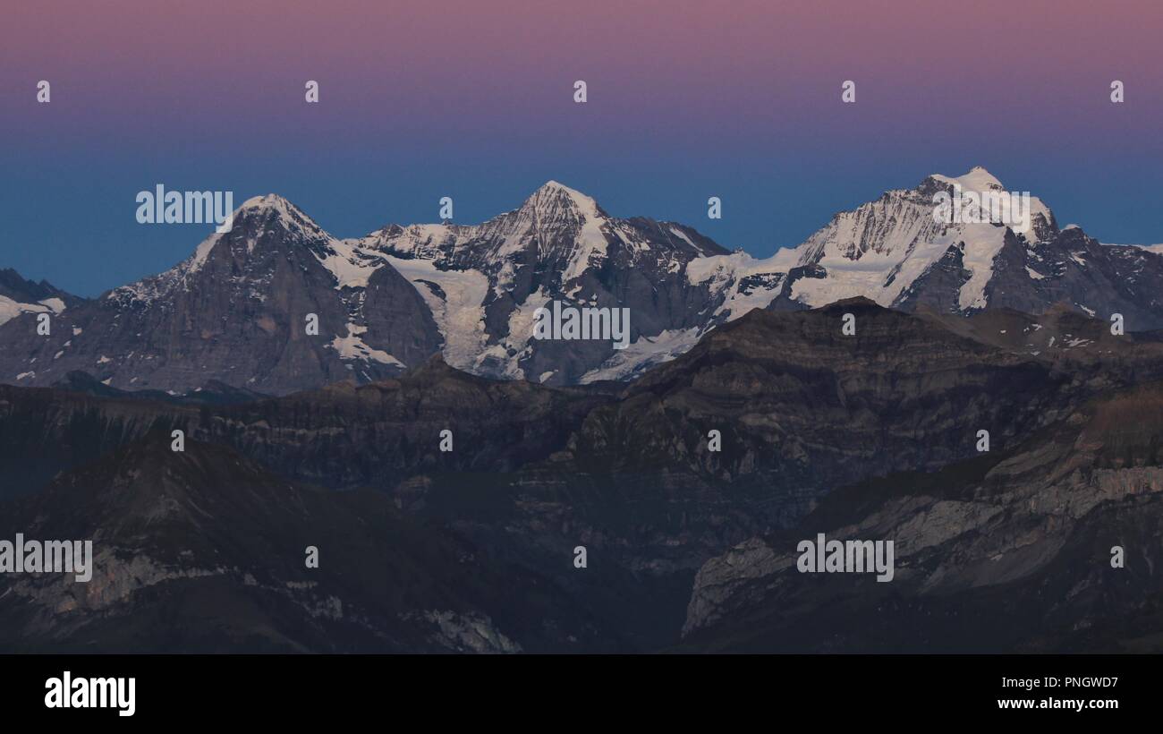 Famous mountain range Eiger, Monch and Jungfrau after sunset Stock ...