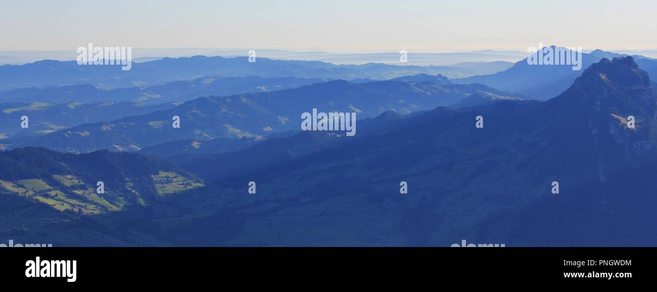 Mountain ranges in the Bernese Oberland at sunrise. View from Mount Niesen, Switzerland. Stock Photo
