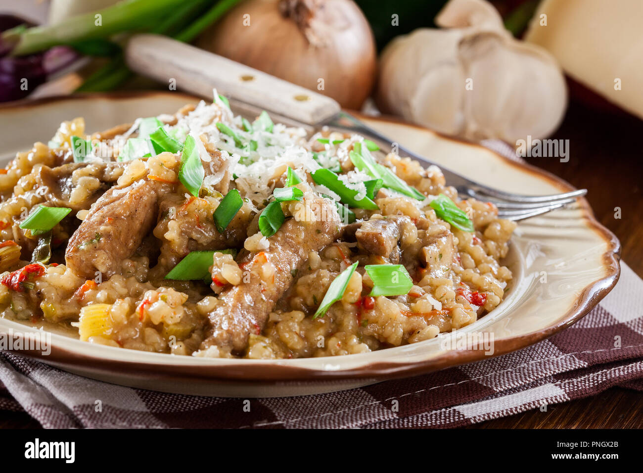 Risotto With Champignon Mushrooms Pork And Parmesan Italian