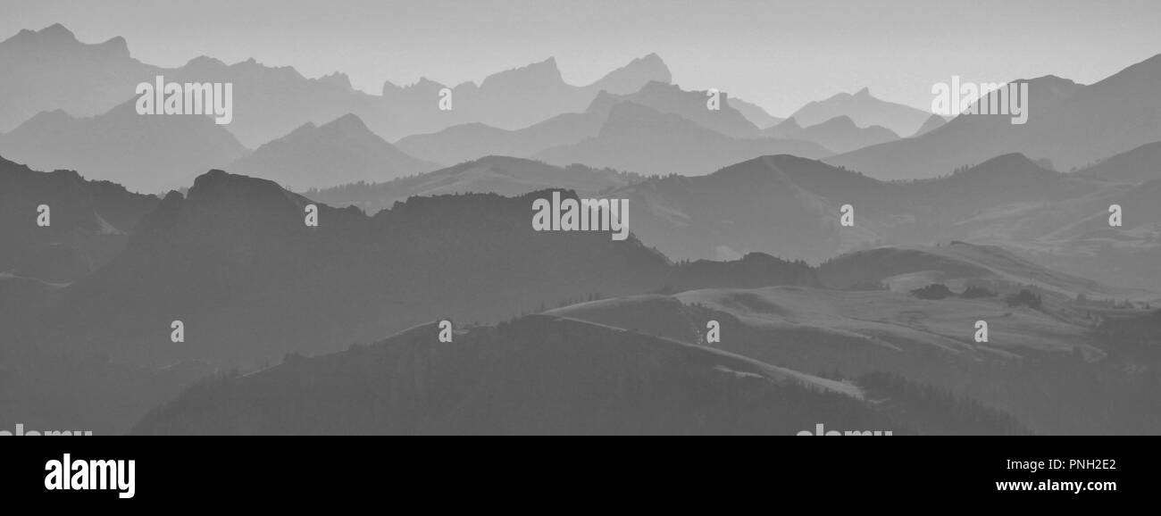Mountain ranges and hills seen from Mount Niesen, Bernese Oberland. Stock Photo