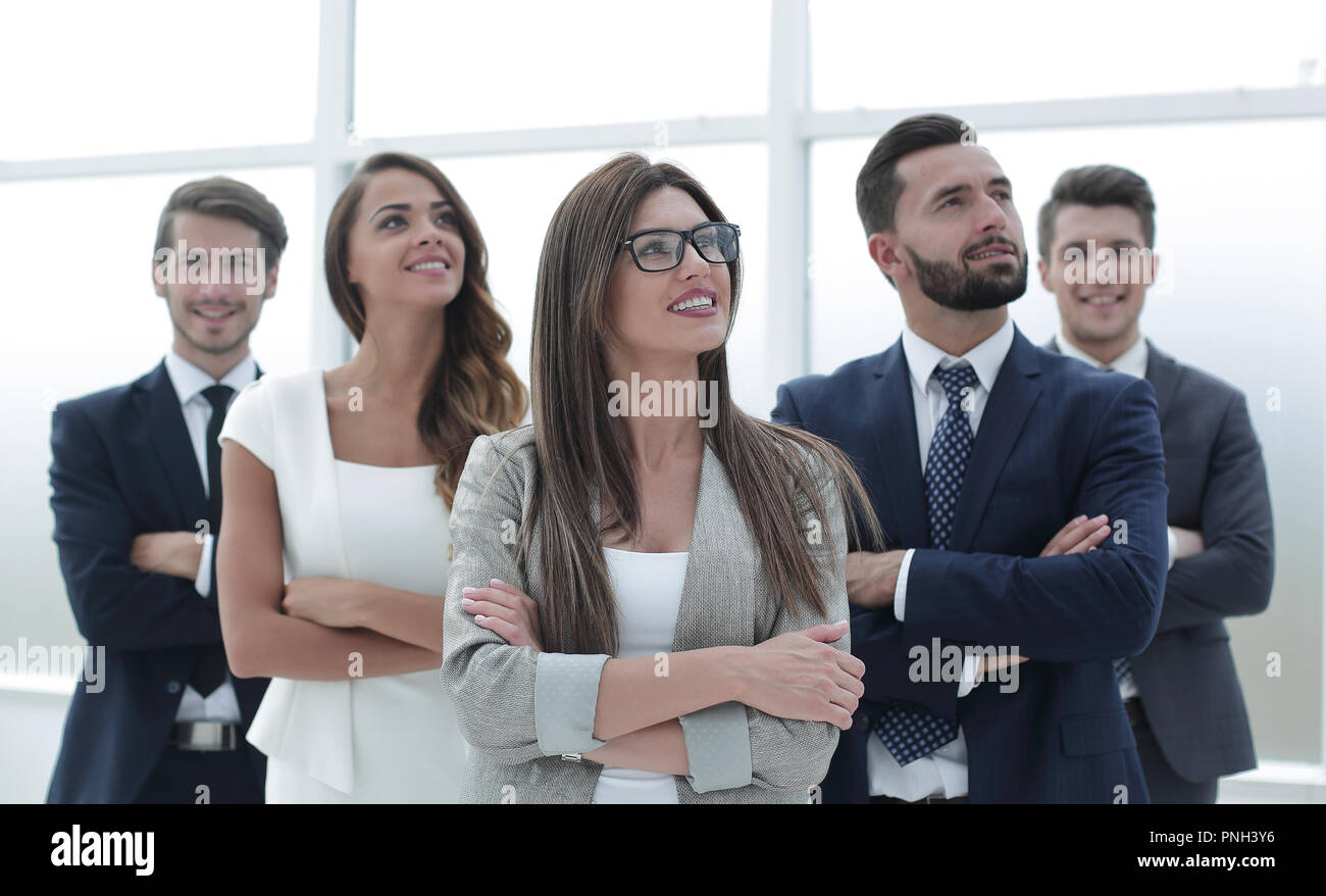 business team standing together and looking at copy space Stock Photo ...