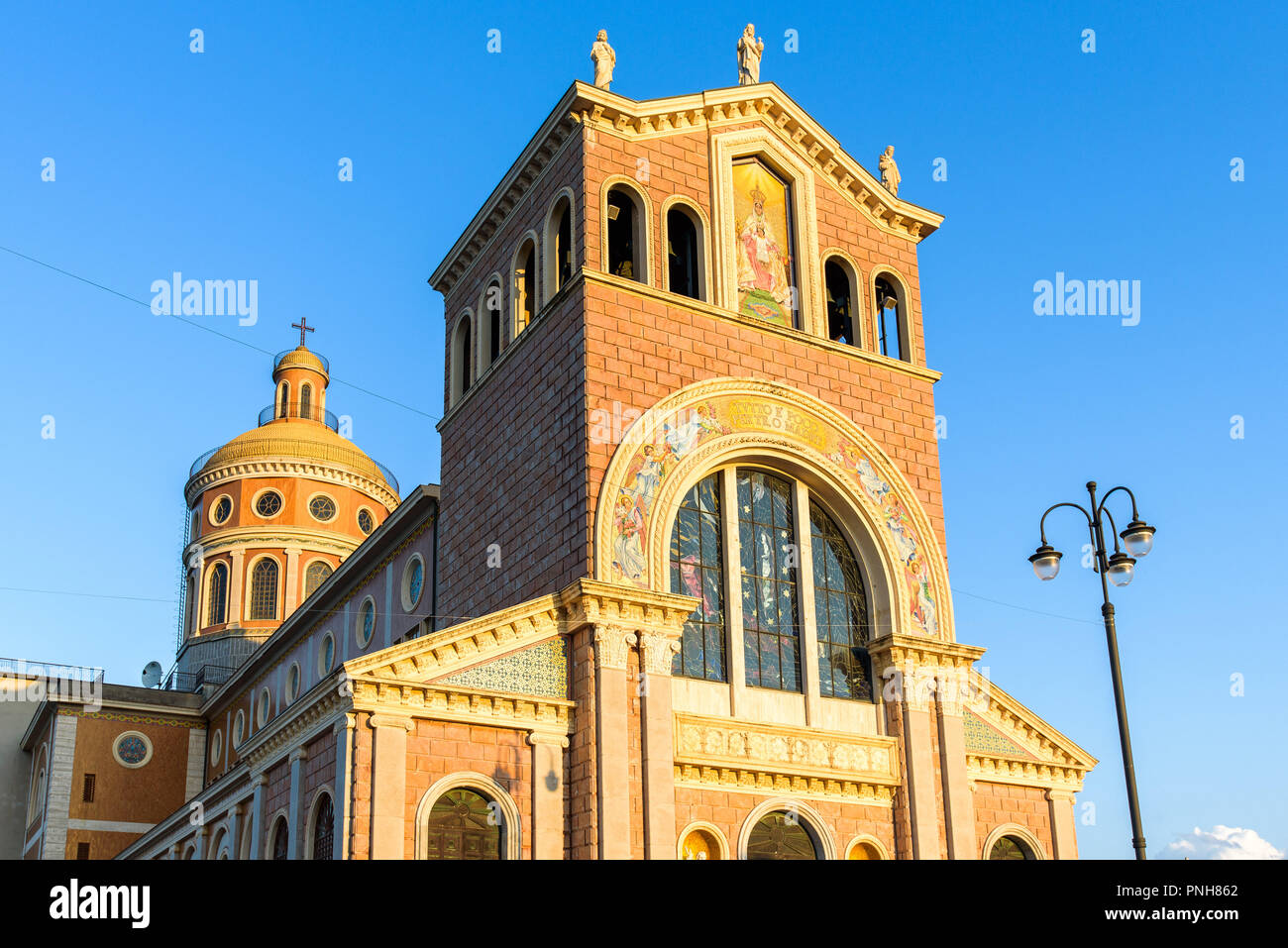 Facade and dome of the Tindari Sanctuary on a cliff with panoramic views of the Aeolian Islands and Patti gulf. It hosts a statue of the Black Madonna Stock Photo