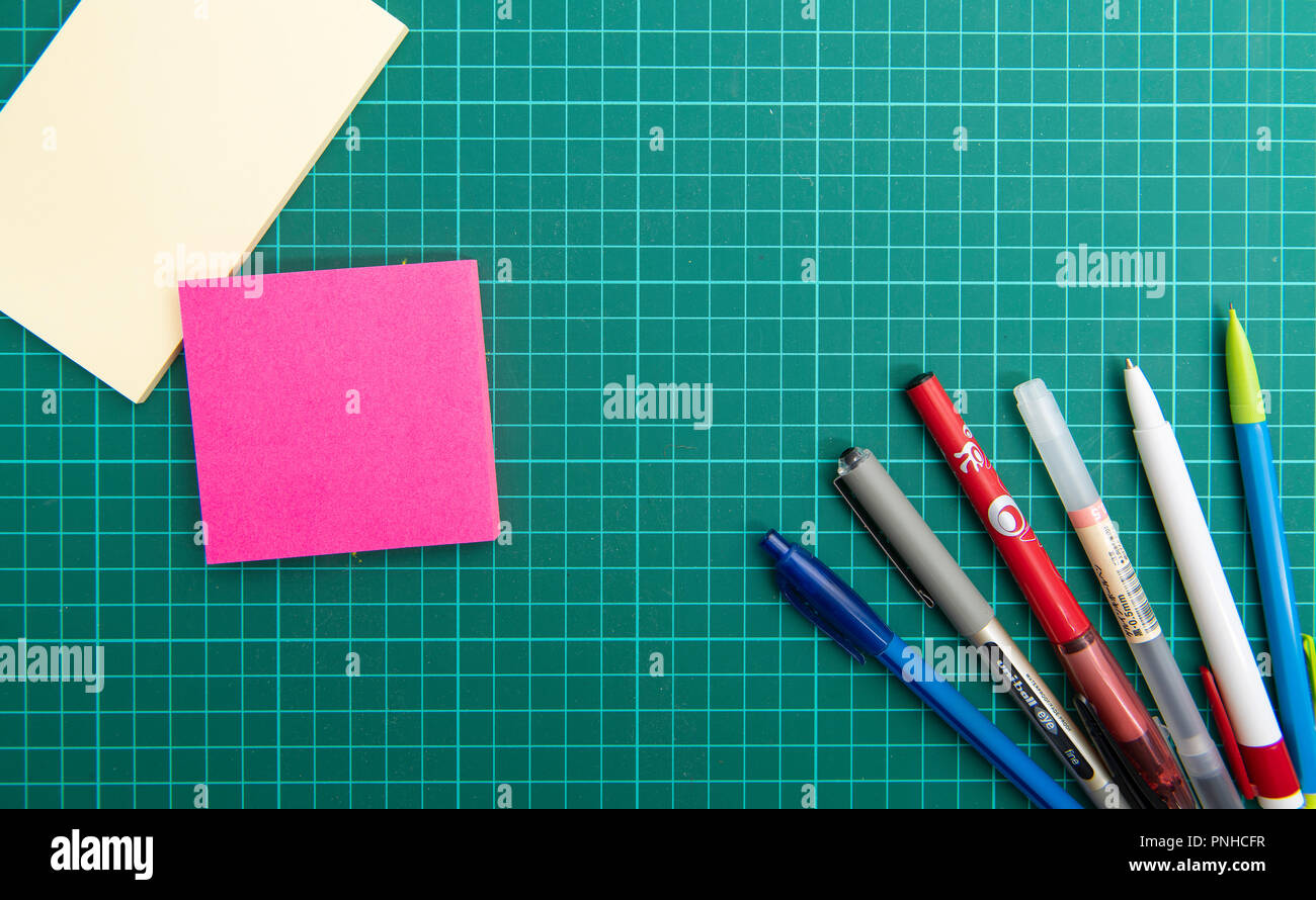 Cutting Mat With Sticky Notes And Pens Stock Photo 219815227 Alamy
