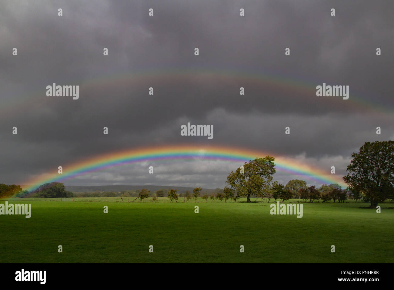 double rainbow after a storm, Northumberland UK Stock Photo - Alamy