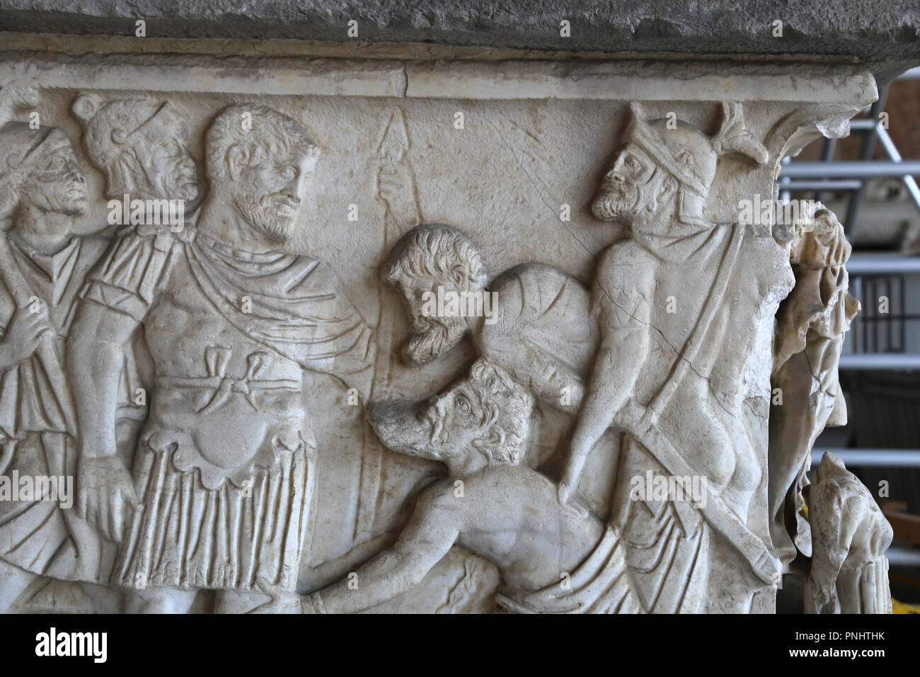 Italy. Pisa. Campo Santo. Stone sarcophagus. Relief of a roman officer with a prisioners. Roman imperial era. Stock Photo