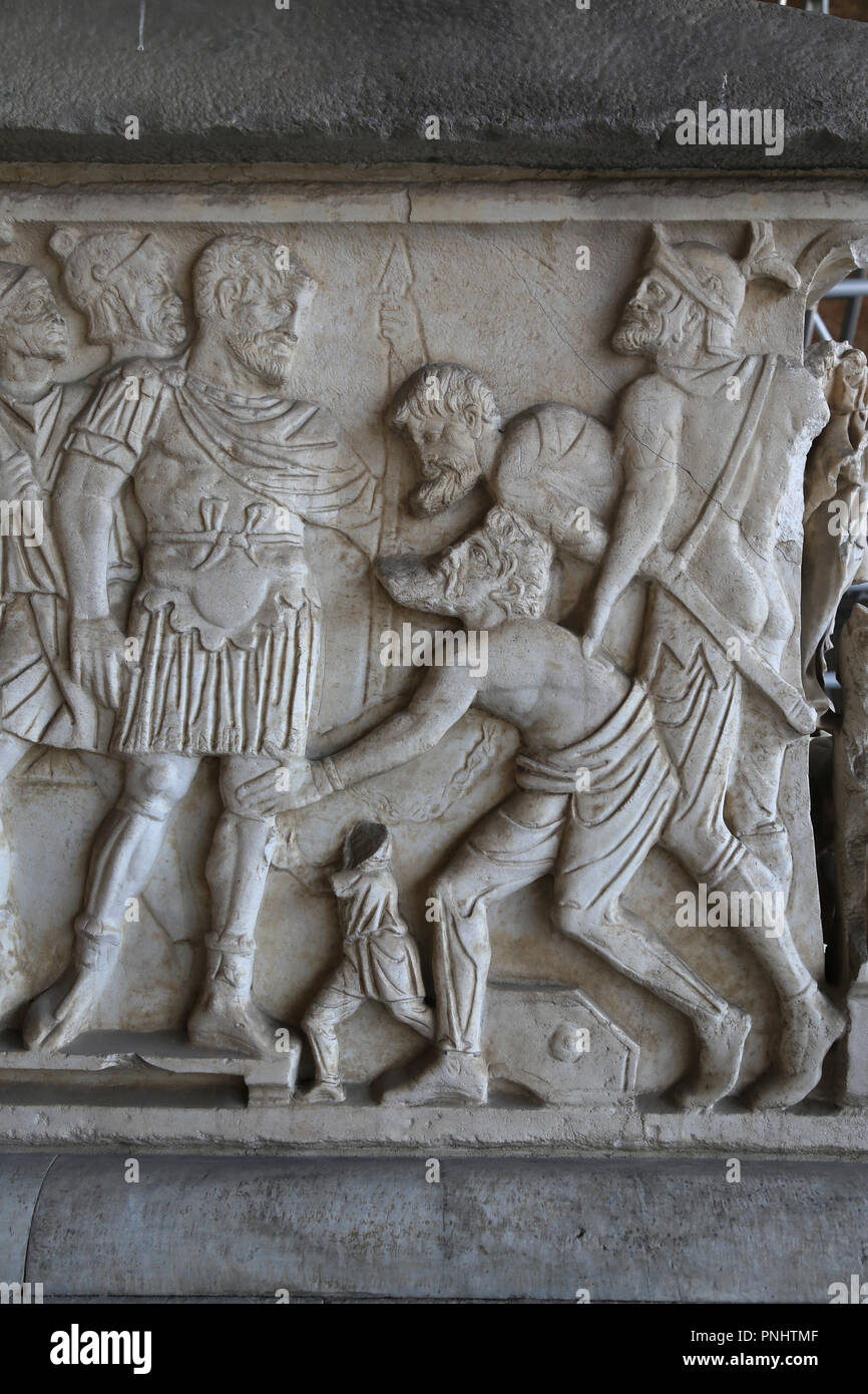 Italy. Pisa. Campo Santo. Stone sarcophagus. Relief of a roman officer with a prisioners. Roman imperial era. Stock Photo