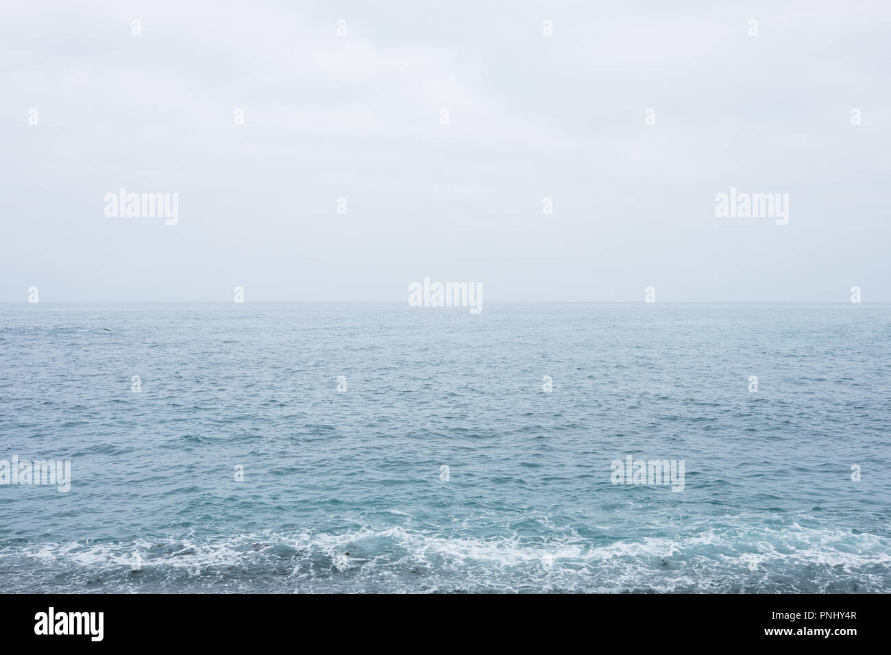Deep sea water waves and stormy sky nature background Stock Photo - Alamy