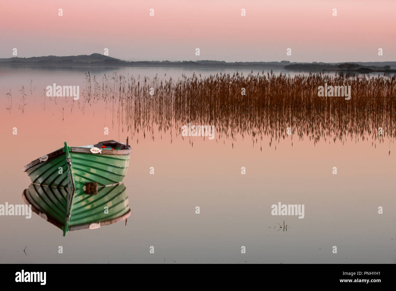Cong, Mayo, Ireland. 06th December, 2008. Rowing boat and Reeds in Lough Cullen, Cong, Co. May, Ireland. Stock Photo