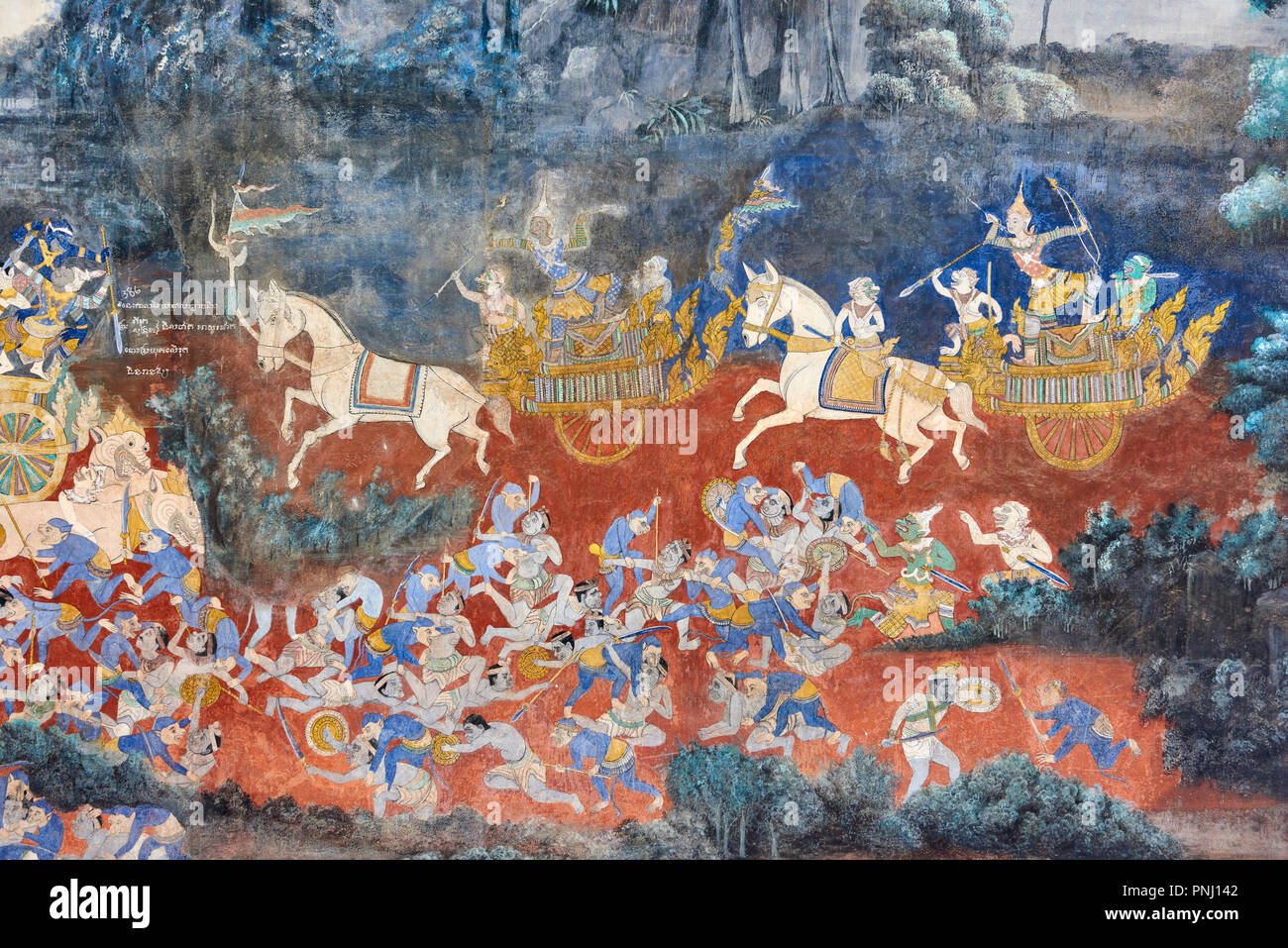 One of the many murals inside the Royal Palace in Phnom Penh, Cambodia, depicting battles between religious characters. Stock Photo