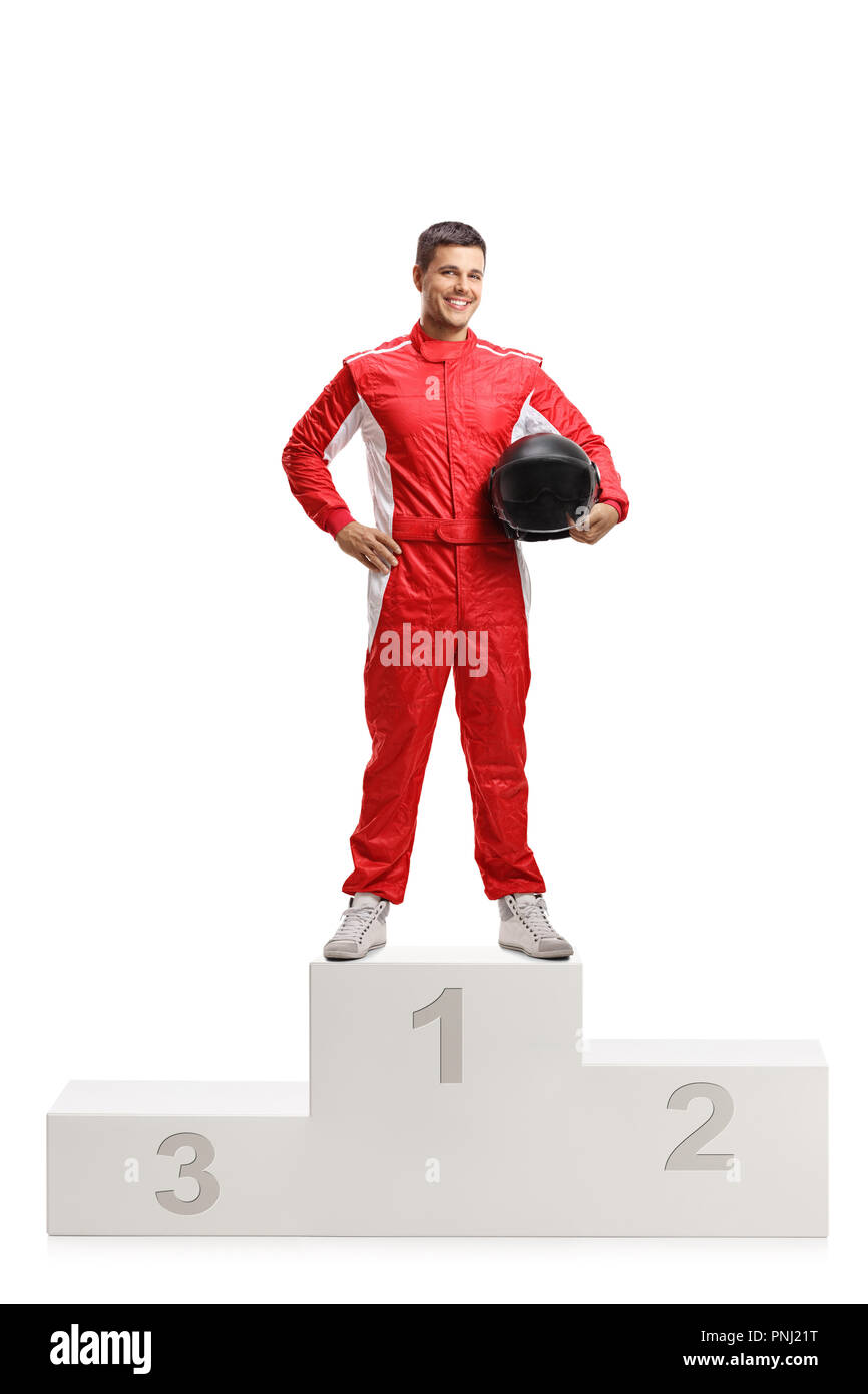 Full length portrait of a male racer winner on a winner's pedestal isolated on white background Stock Photo