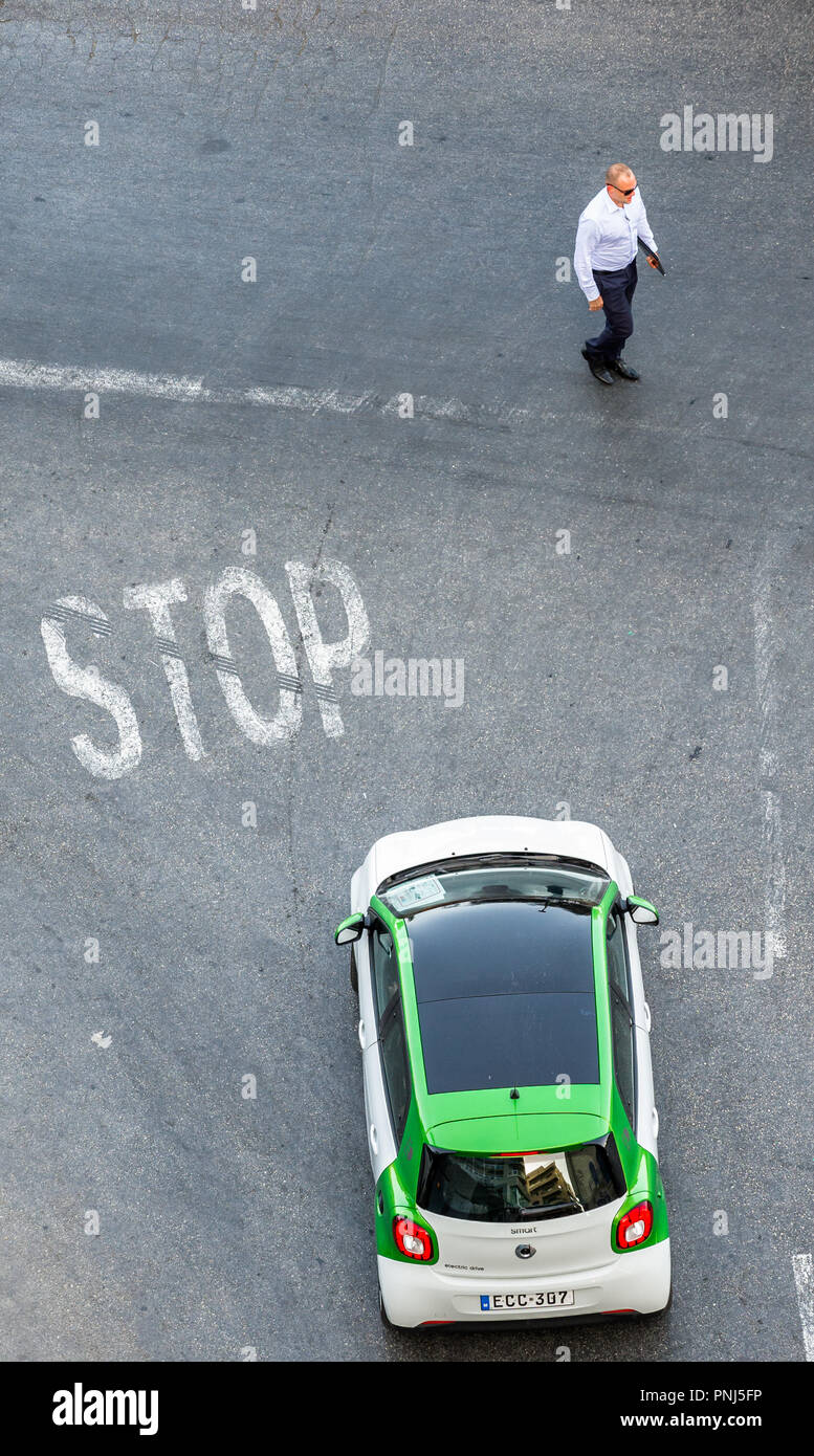Road sign, STOP, painted onto the road. Stock Photo