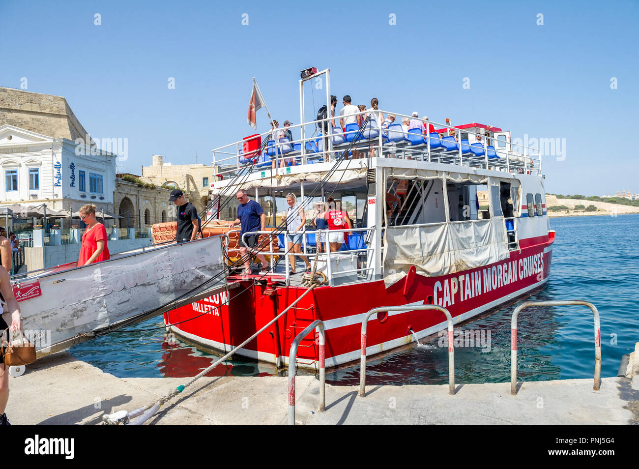 Ferries carrying passengers from Valletta to Sliema on the mediterranean island of Malta. Stock Photo