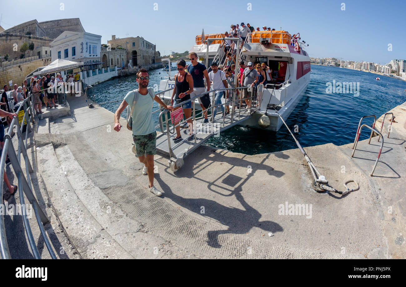 Ferries carrying passengers from Valletta to Sliema on the mediterranean island of Malta. Stock Photo