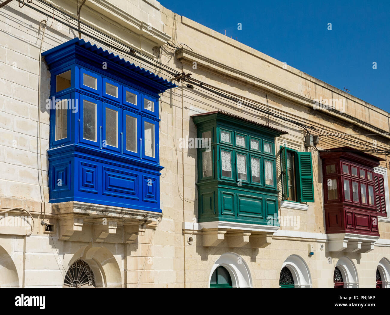 Traditional couourful Maltese Balconies. Stock Photo