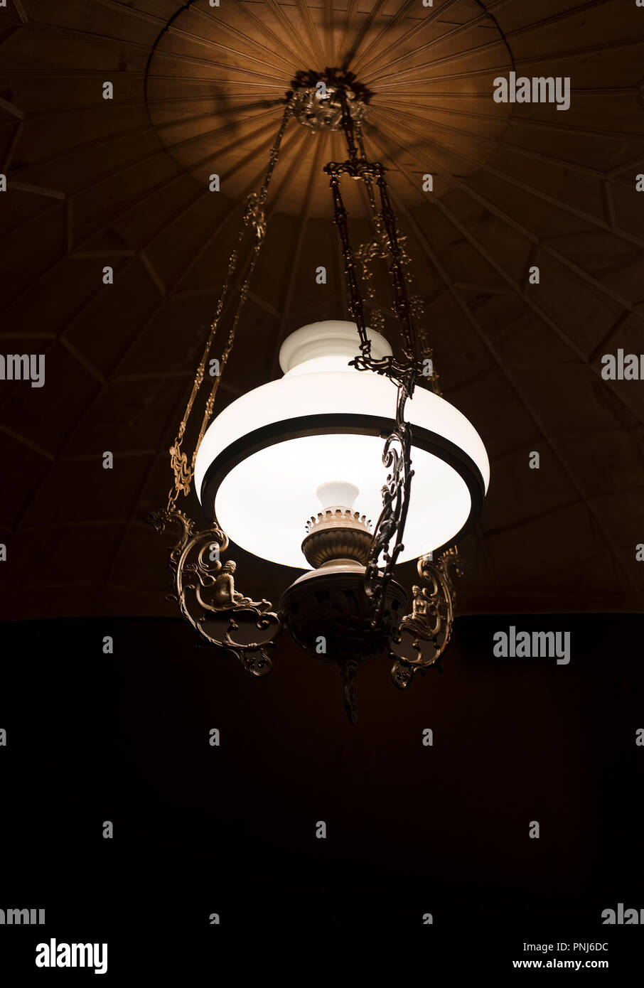 White warm lighting coming out from beautiful lamps hanged on the