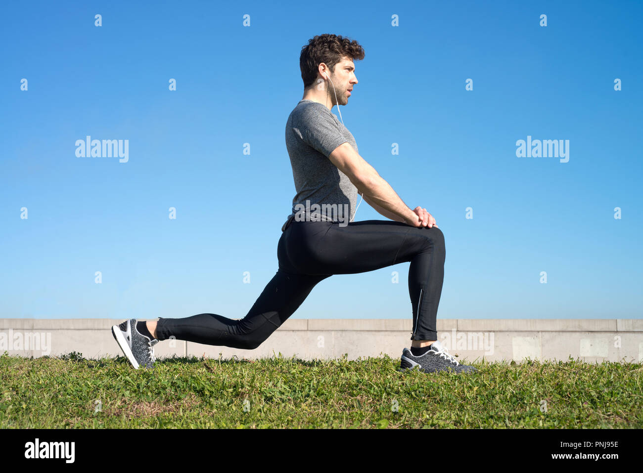 Person stretching grass hi-res stock photography and images - Alamy