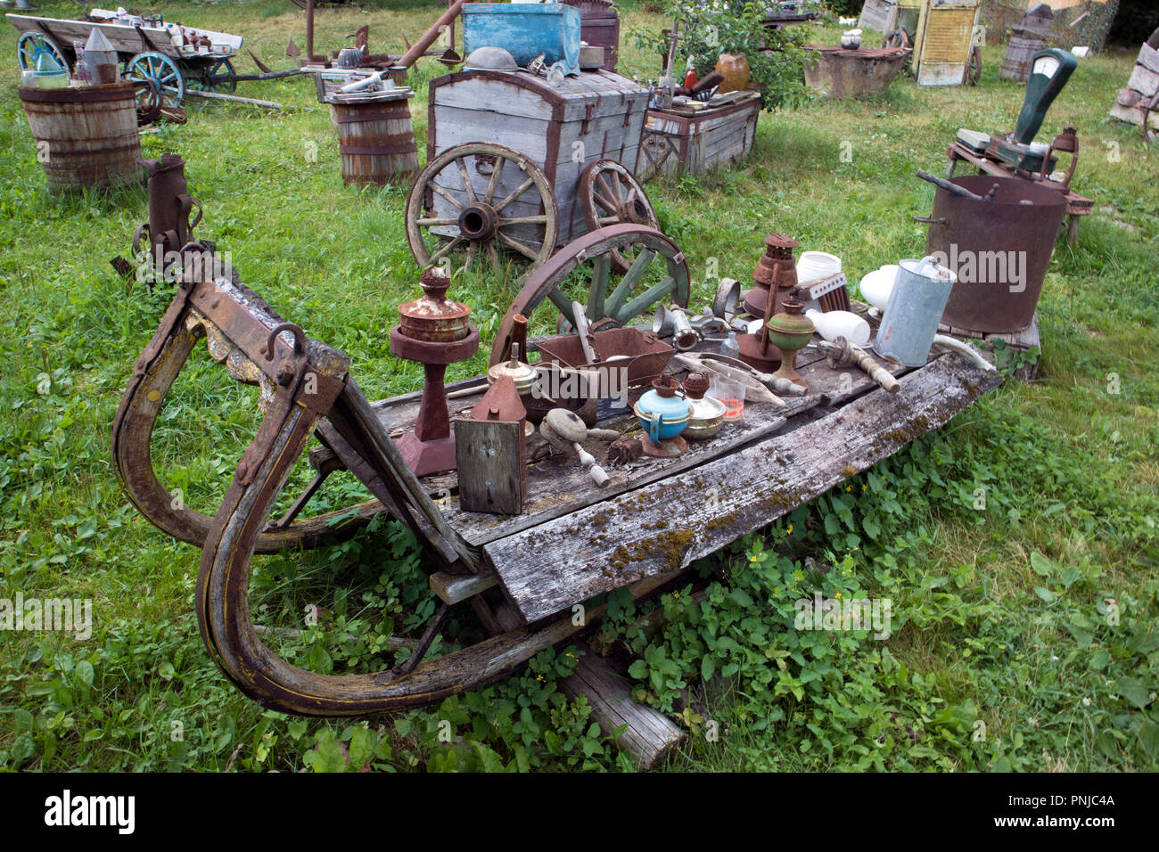 Open air museum of old unnecessary things, antique unwanted junk in old open sleigh Stock Photo