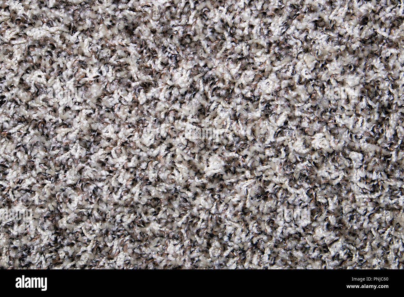 Grey synthetic short-napped floor carpet covering, may be used as background or texture Stock Photo