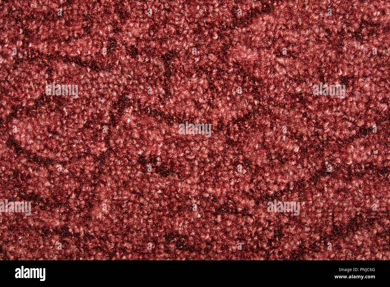 Burgundy synthetic short-napped floor carpet covering, may be used as background or texture Stock Photo