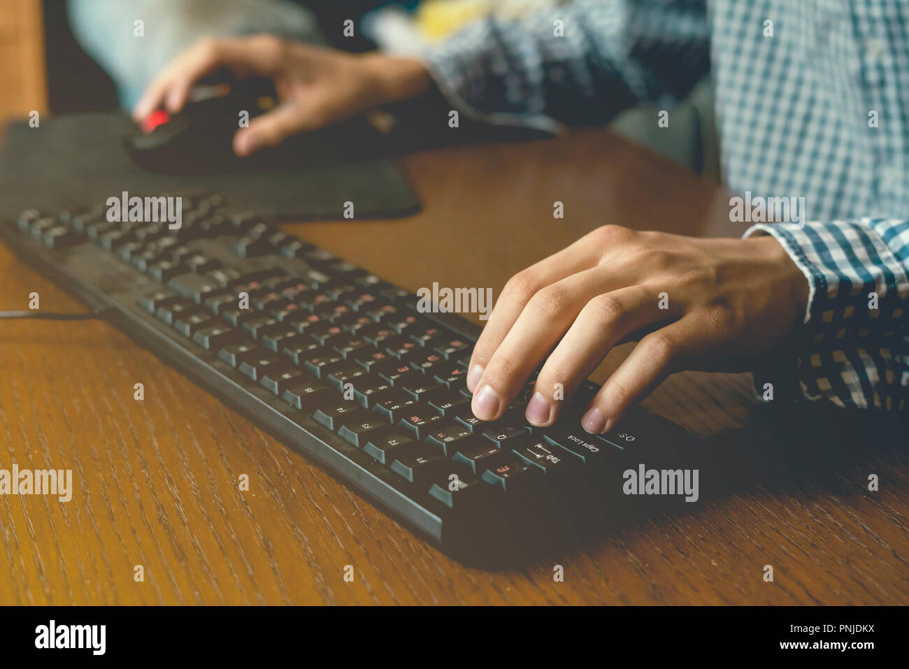 Close Up Hands Play Video Games On Desktop Pc At Home On Table Using Keyboard And Mouse Stock Photo Alamy Close Up Hands Play Video Games On Desktop Pc At Home On Table Using Keyboard And Mouse Stock Photo Alamy