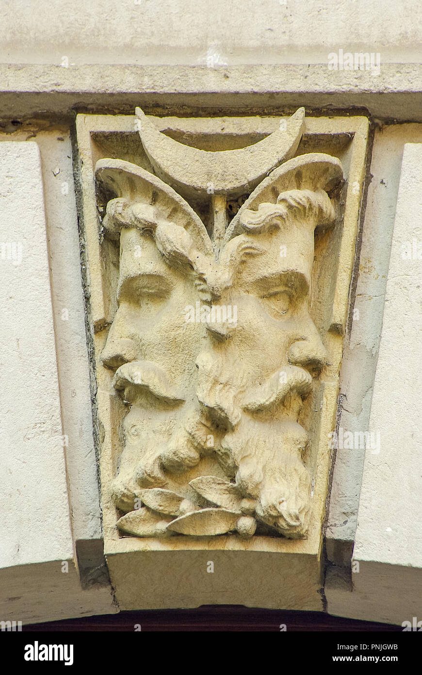Double face, Janus head as capstone on a doorway arch, Koenigstein, Saxony, Germany. Stock Photo