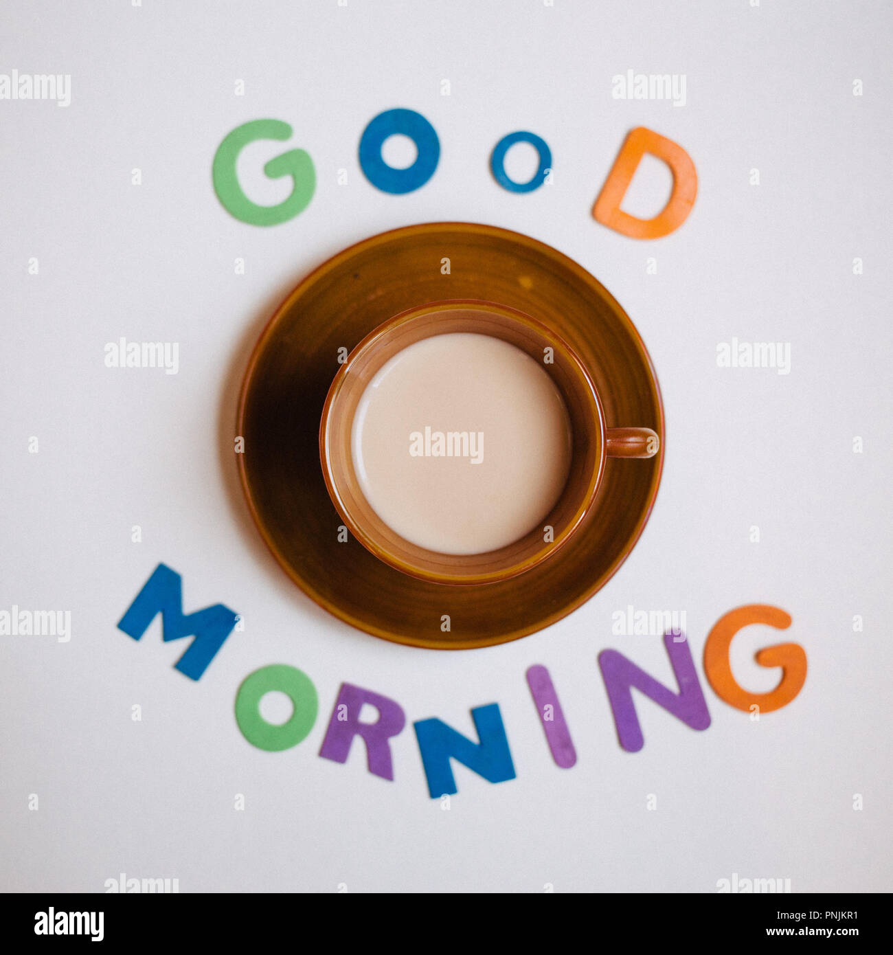 Good Morning ,Cup of coffee with the colorful alphabet letters Stock Photo