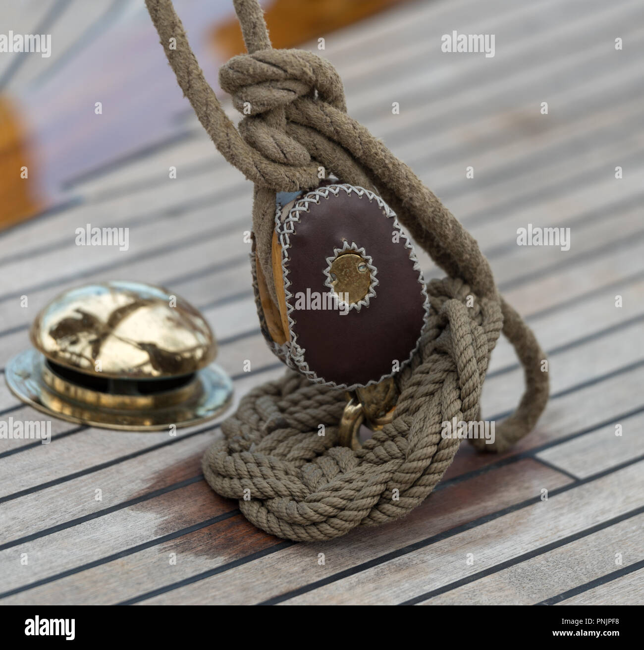 Sailing boat pulley with nautical rope Stock Photo