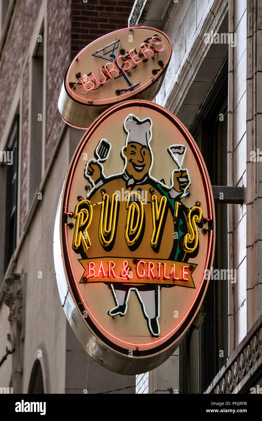 Old neon sign on Rudy´s Bar & Grille burger restaurant, Downtown Chicago, IL. Stock Photo