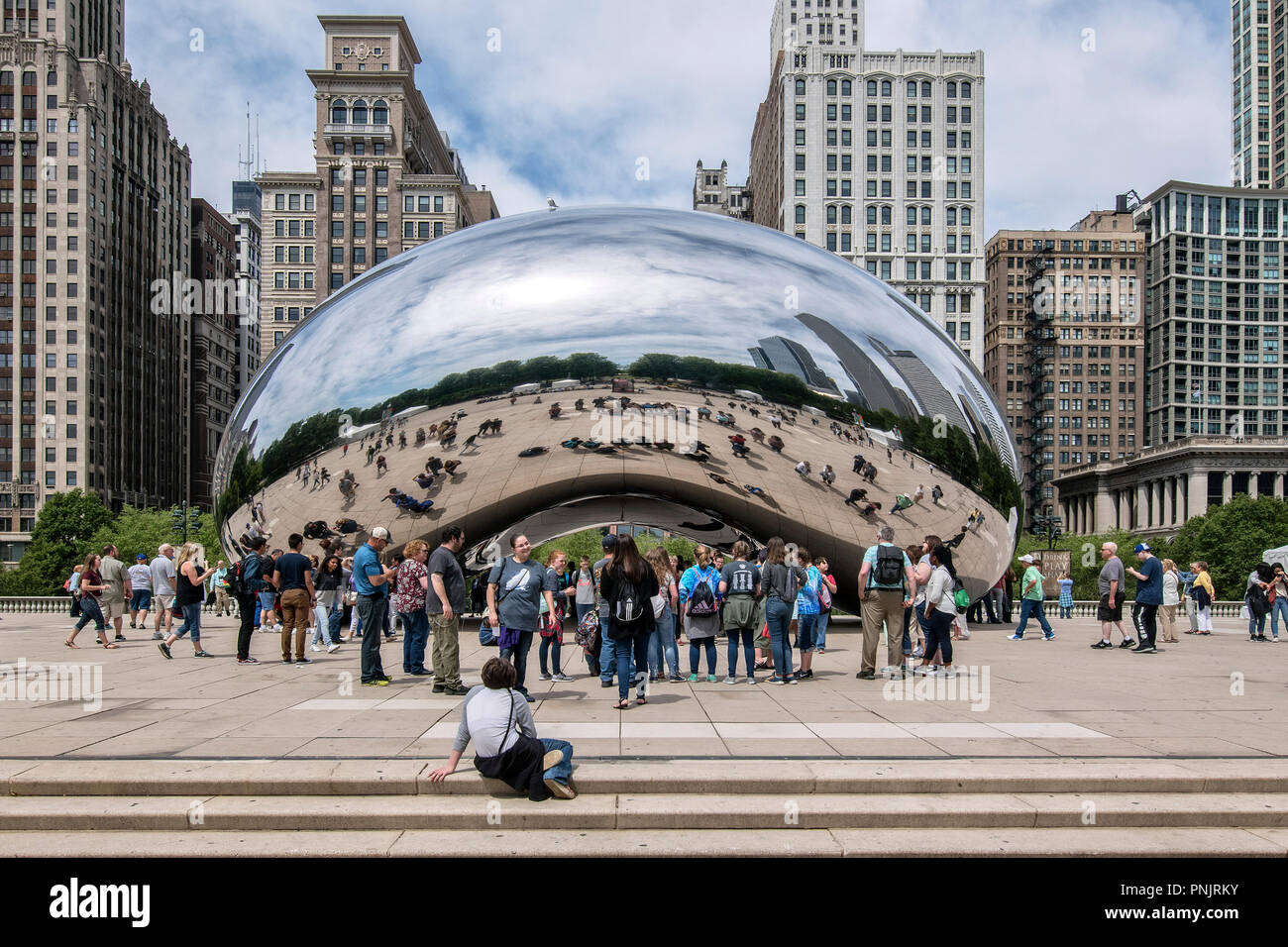 Cloud Gate sculpture, The Bean, by British artist Anish Kapoor, in Millennium Park, Downtown Chicago, IL. Stock Photo