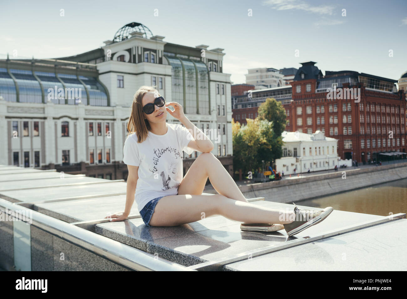 Pretty woman on bridge hi-res stock photography and images - Alamy