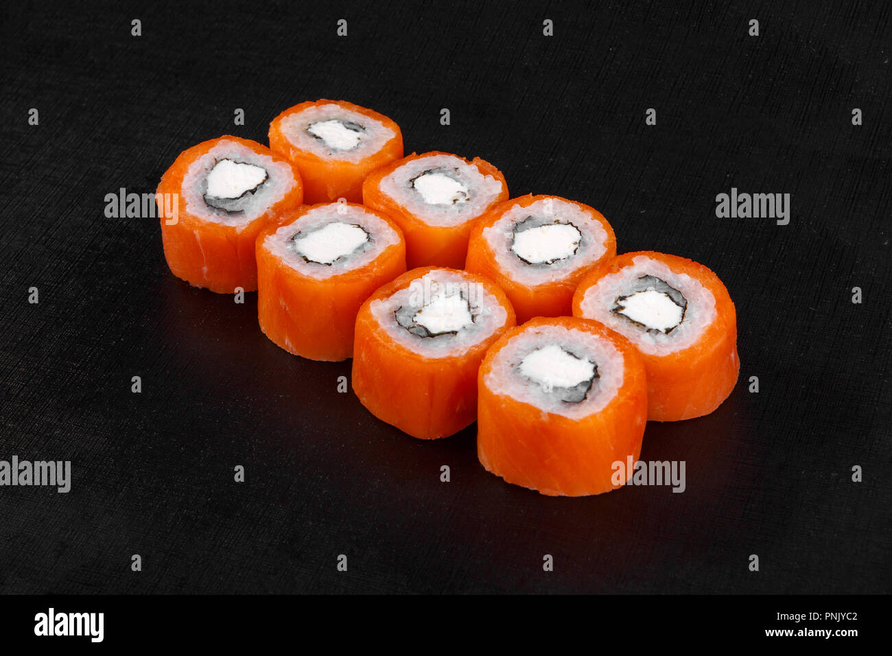 Sushi, rolls, uramaki, philadelphia, with salmon, crab meat, cheese