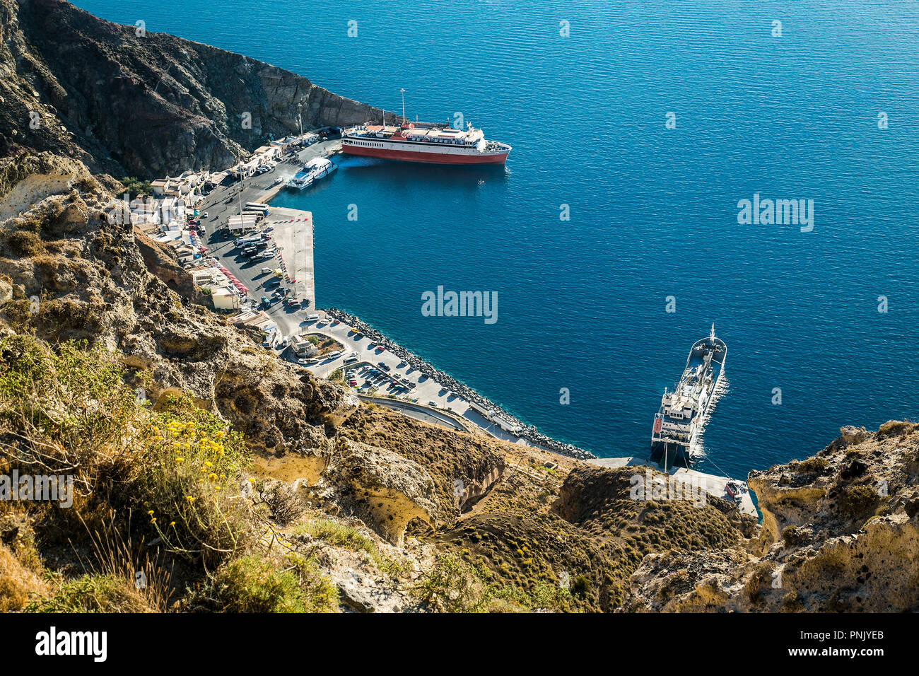 The Cruise Port and the Aegean Sea View from Caldera Cliffs of Santorini Island, Greece Stock Photo
