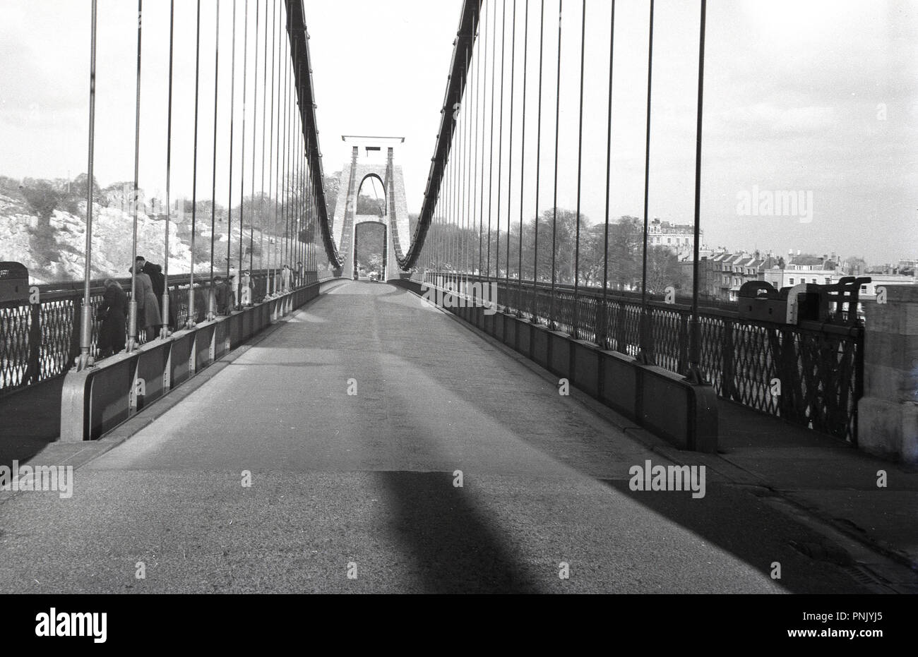 1950s, Bristol, a view down the clifton suspension bridge, a wrought iron bridge, first designed by the famous Victorian engineer Isambard Kigdom Brunel and opened in 1864. Stock Photo