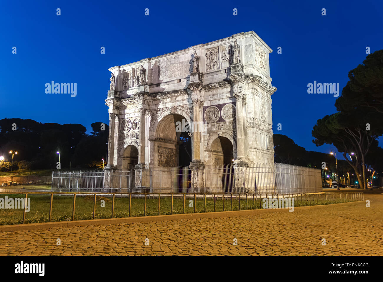 The Arch of Constantine, view from Colloseum at night Stock Photo Alamy