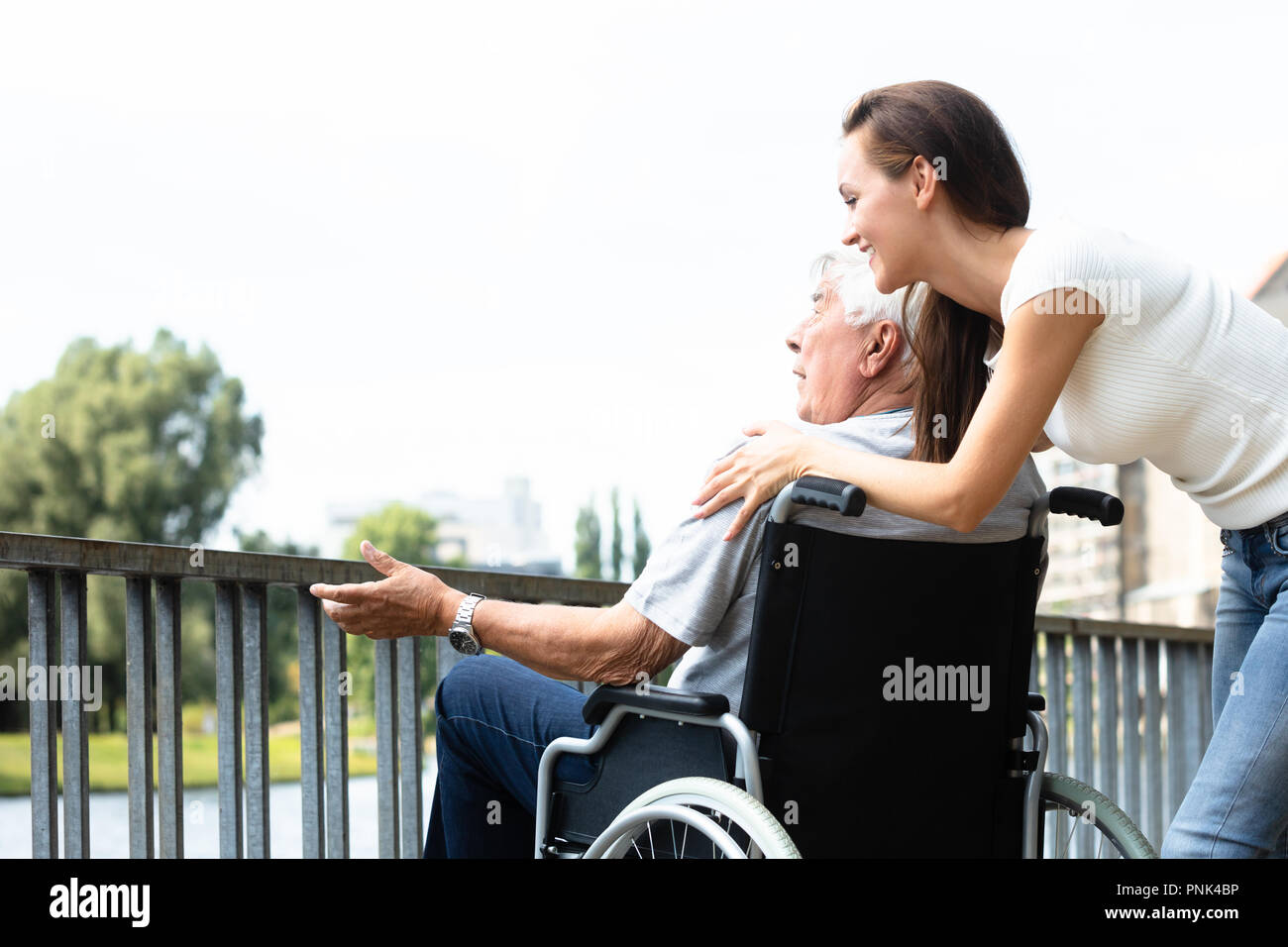 Old people care outdoors hi-res stock photography and images - Alamy
