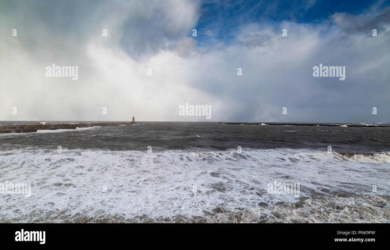 Snow shower off Tynemouth,  North East Coast of the UK Stock Photo
