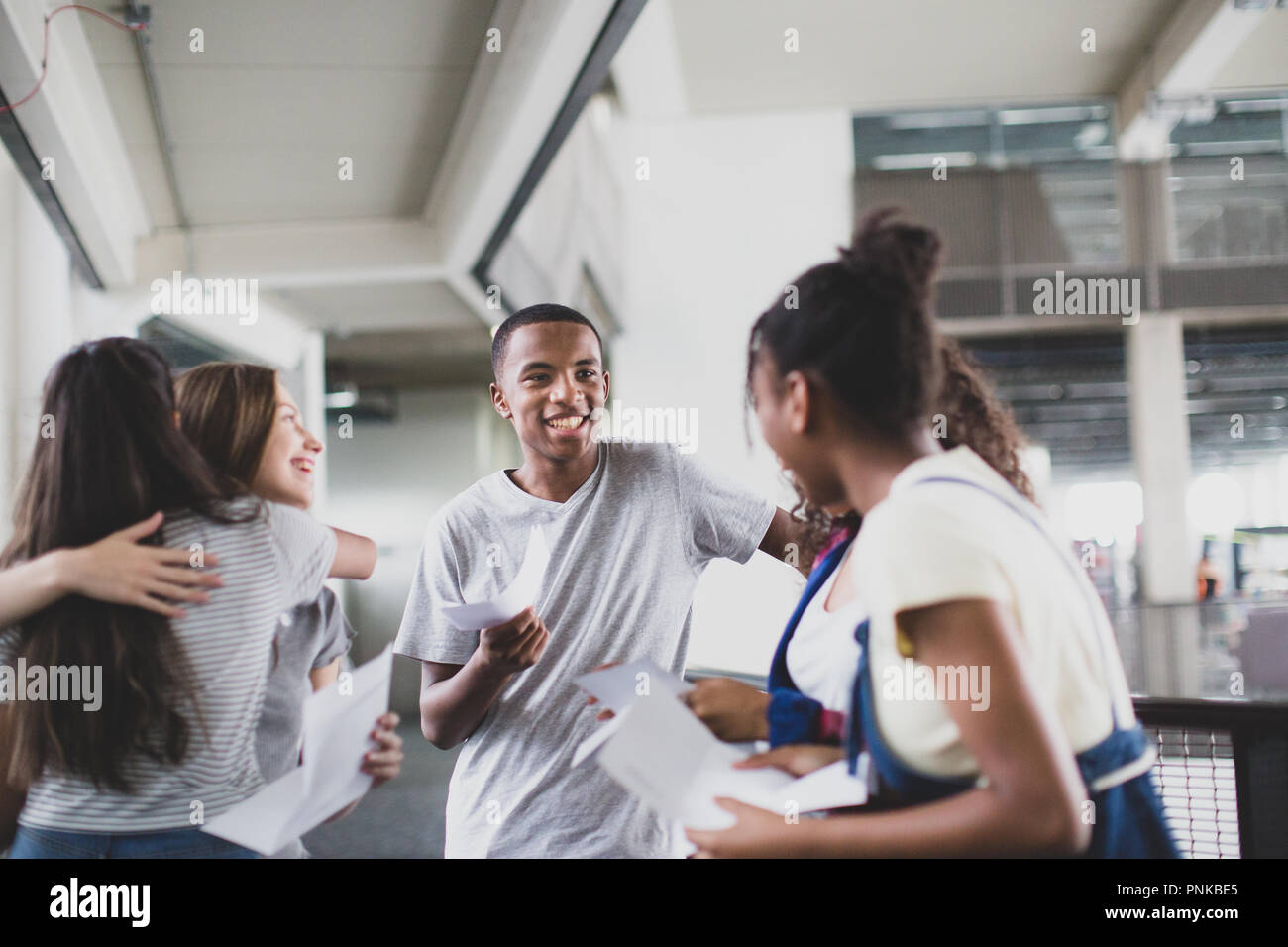 High school students opening their exam results Stock Photo