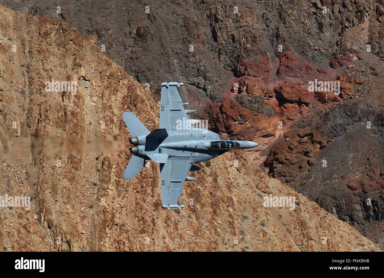 E/A-18G Growler of VX-31 Dust Devils on low level pass through Star Wars Canyon on Jedi transition, Death Valley, California. Stock Photo