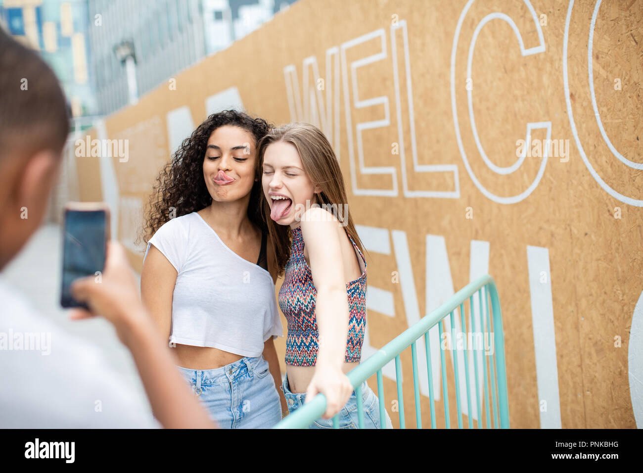 Teenagers posing for a smartphone photo Stock Photo