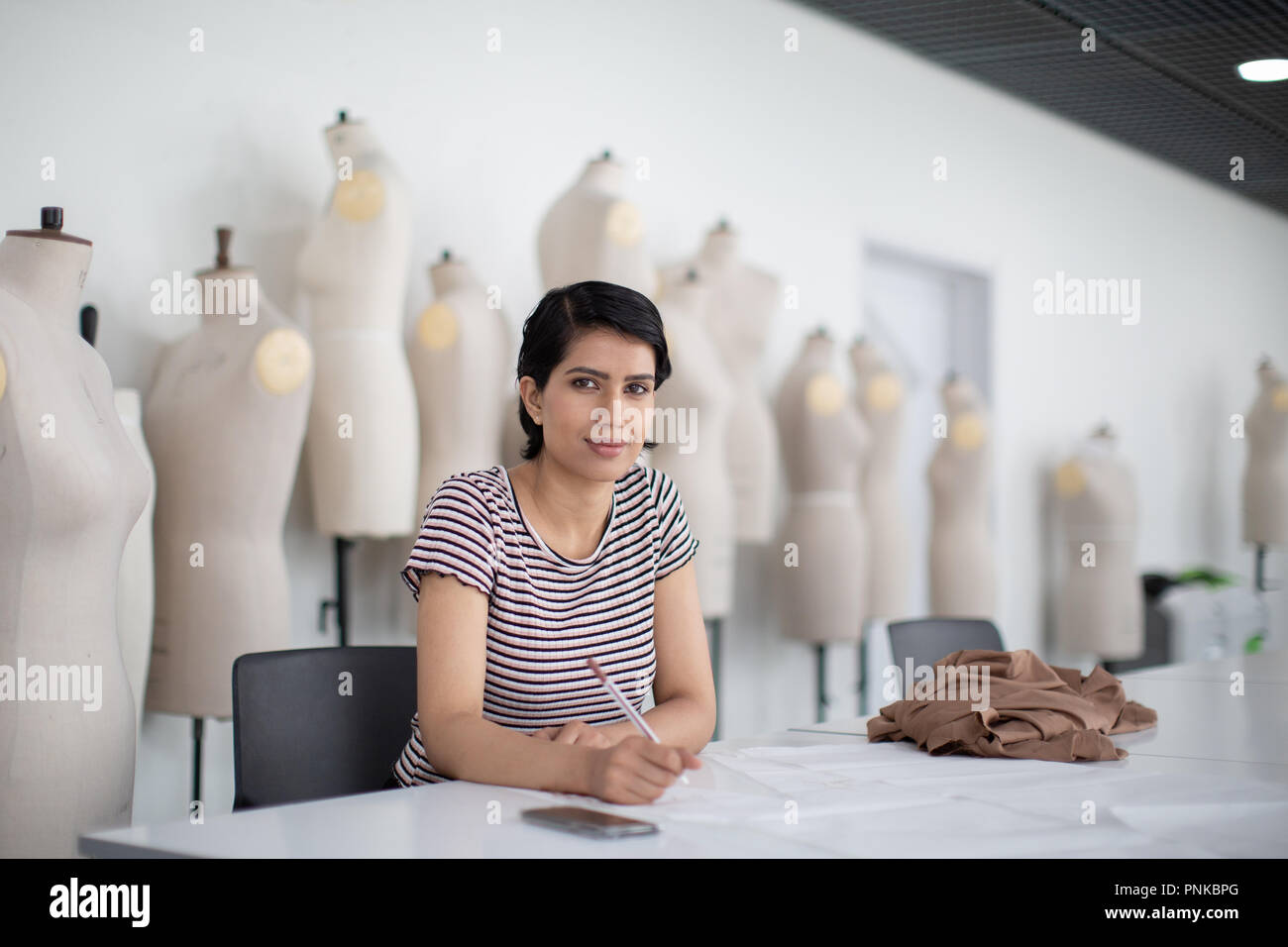 Portrait of Arabic female student fashion designer Stock Photo